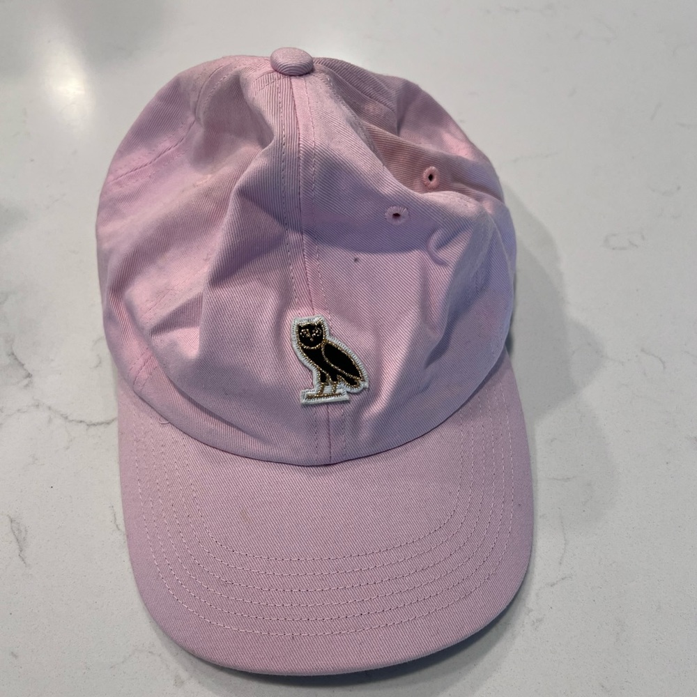 October’s Very Own pink hat